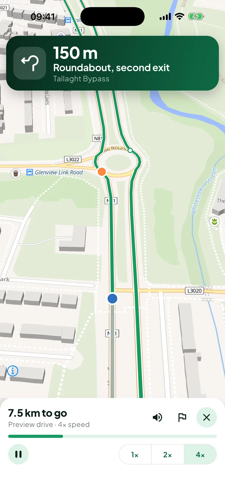 PassRoutes guiding a drive: a banner reads “150 m, Roundabout, second exit” above a map with the route in green.