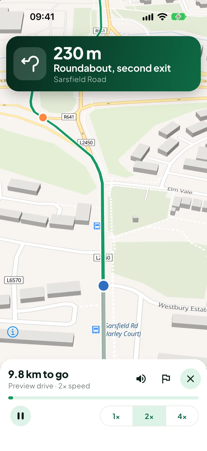 A guided drive with the next instruction: “230 m, Roundabout, second exit”.